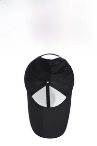 Detailed view of black baseball cap featuring breathable mesh lining and metal buckle
