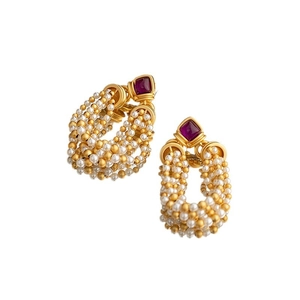 Vintage gold weave tassel earrings with purple gems and white pearls on white background