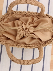 Handmade khaki paper rope woven beach bag with drawstring lining and sturdy handles