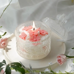 Pink peach blossom cake scented candle in crown embossed glass jar with romantic decor