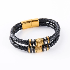 Detail of double-layer braided leather bracelet with gold stainless steel magnetic clasp