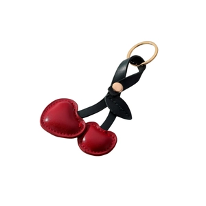 Red PU leather heart-shaped cherry keychain with black leaf and gold metal ring