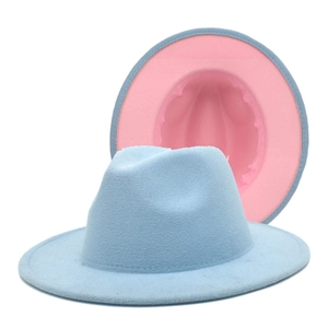 Detail of light blue and pink wide brim fedora hat showing dual-tone wool felt material