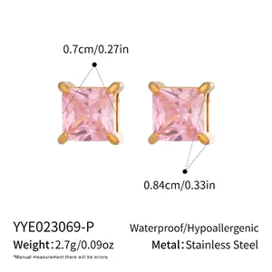 Detail view of 18K gold plated stainless steel stud earrings with pink square zircon