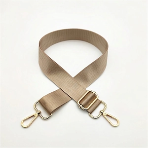 Adjustable khaki canvas bag strap with durable gold metal hooks and thick fabric texture