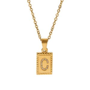 Close-up of 18k gold plated rectangular pendant with crystal encrusted C initial