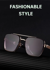 Detail view of champagne gold metal square frame sunglasses with gradient grey lenses