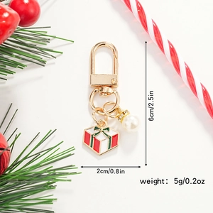 Christmas gift box pendant keychain detail with size and weight measurements in inches