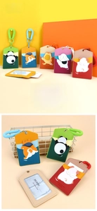 Detail view of five animal-style PU card holders with retractable cords and hooks