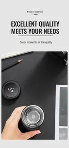 Detail of LED smart temperature display lid and stainless steel tea filter on black bottle