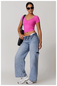 Close-up of rose pink breathable yoga T-shirt with U-neck and button detailing