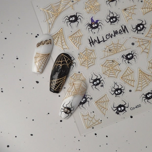 Detailed Halloween nail stickers featuring gold spider webs and black spiders Co-450