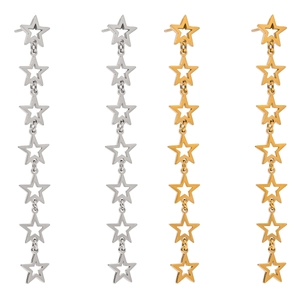 Pair of star drop earrings in 18k gold and silver stainless steel on white background