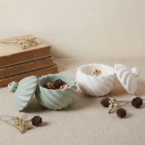 Spiral textured resin molds for storage jars in mint green and white ceramic style