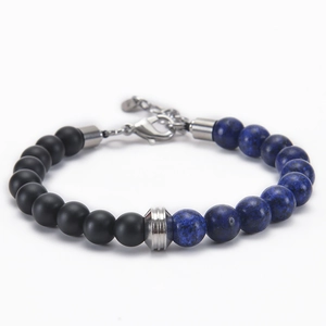 Close-up of 8mm natural stone bead bracelet with blue lapis and matte black onyx beads
