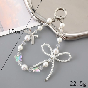 Handmade pearl and bow beaded phone charm strap with 15cm length and 22.5g weight