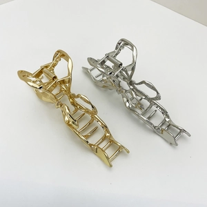 Elegant gold and silver bow-shaped metal hair claws for women with thick hair