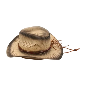 Close-up of bohemian straw hat with brown gradient brim and braided decorative band
