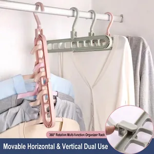 Space-saving 9-hole magic clothes hanger with 360 degree rotation in pink and green colors
