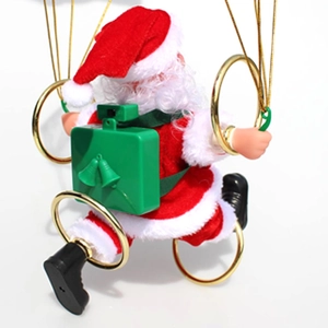 Close-up of electric Santa Claus toy with green battery backpack and golden hanging rings