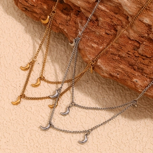 Collier double rang en acier inoxydable avec pendentifs lune en finitions or et argent