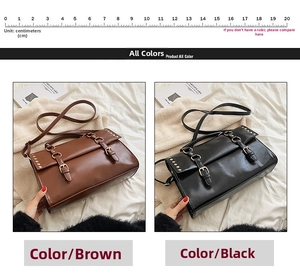 Detail view of vintage leather messenger bags in brown and black with buckle accents