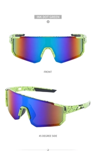 Detail view of fluorescent green cycling glasses with black ink dots and colorful lenses