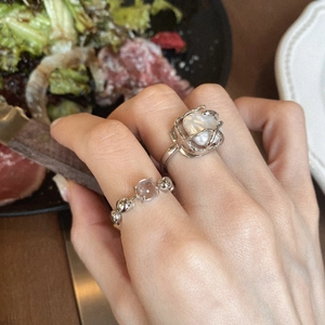 Vintage Baroque pearl ring set in liquid metal style with pink zircon gemstone accent