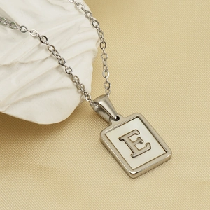 Silver square shell necklace with alphabet E pendant on a minimalist chain