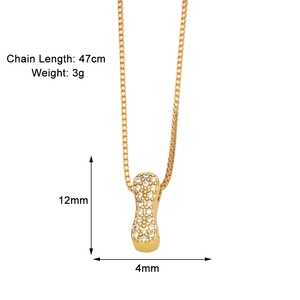 Detailed close-up of gold peanut necklace with zircon inlay and product dimensions