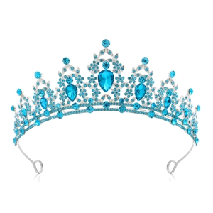 Silver bridal crown detail with teardrop blue crystals and intricate hollow metalwork