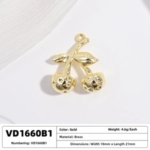 Detail of a cherry-shaped brass pendant in gold finish showing dimensions 18mm by 21mm