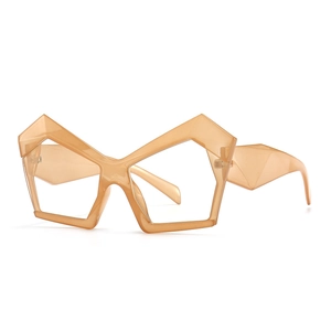 Translucent amber orange cat-eye polygon glasses with thick faceted geometric temples