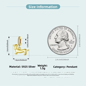 Detail of S925 silver dachshund pendant with gold plating and zirconia stones