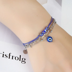 Böhmisches mehrlagiges Evil Eye Armband mit blauem Seil und silbernen Perlen