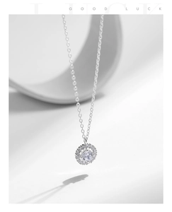 Detailed view of S925 sterling silver halo pendant necklace with sparkling center stone