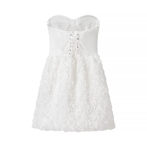 White strapless mini dress featuring 3D rose petal textures and lace-up back design