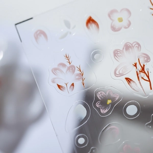 Thin semi-transparent floral nail stickers with pink and red hand-drawn flower patterns