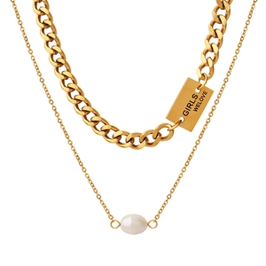Double-layered gold chain necklace featuring thick curb link and a natural freshwater pearl