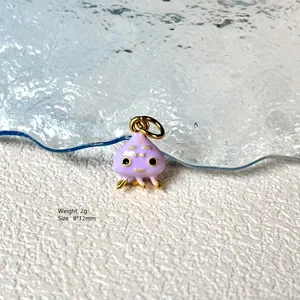Detail of purple cartoon octopus pendant with 8x12mm size and 2g weight specs