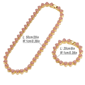 Golden 10mm Cuban chain set with pink crystal hearts including necklace and bracelet