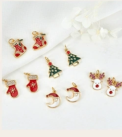 Christmas themed gold alloy pendants with red and green enamel and small rhinestones