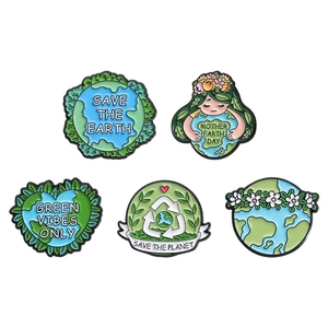 Five eco-friendly enamel pins with Save the Earth and Green Vibes Only themes