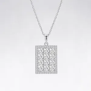 Macro shot of polished S925 silver rectangle moissanite pendant with pavé setting