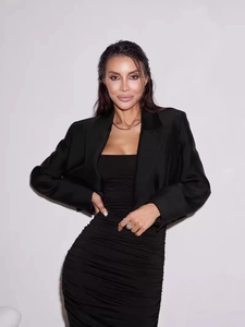 Elegant black bodycon ruched dress paired with a cropped blazer for a chic evening look