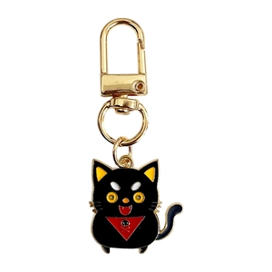 Halloween cartoon black cat keychain with red skull scarf and gold metal clasp on white back