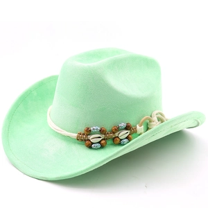 Detail of mint green cowboy hat featuring shell accents and wooden beads on woven trim