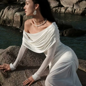 Elegant white mesh long sleeve bodycon dress with off-shoulder ruffles and pleated details