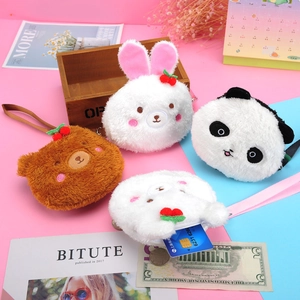 Cute plush animal coin purse detail showing storage of bank cards and metal coins