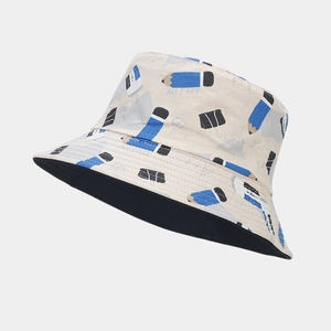 Double-sided cotton bucket hat with stationery print and solid black lining